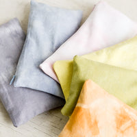 5: An assortment of relaxation eye pillows in a naturally dyed, rainbow span of colors.