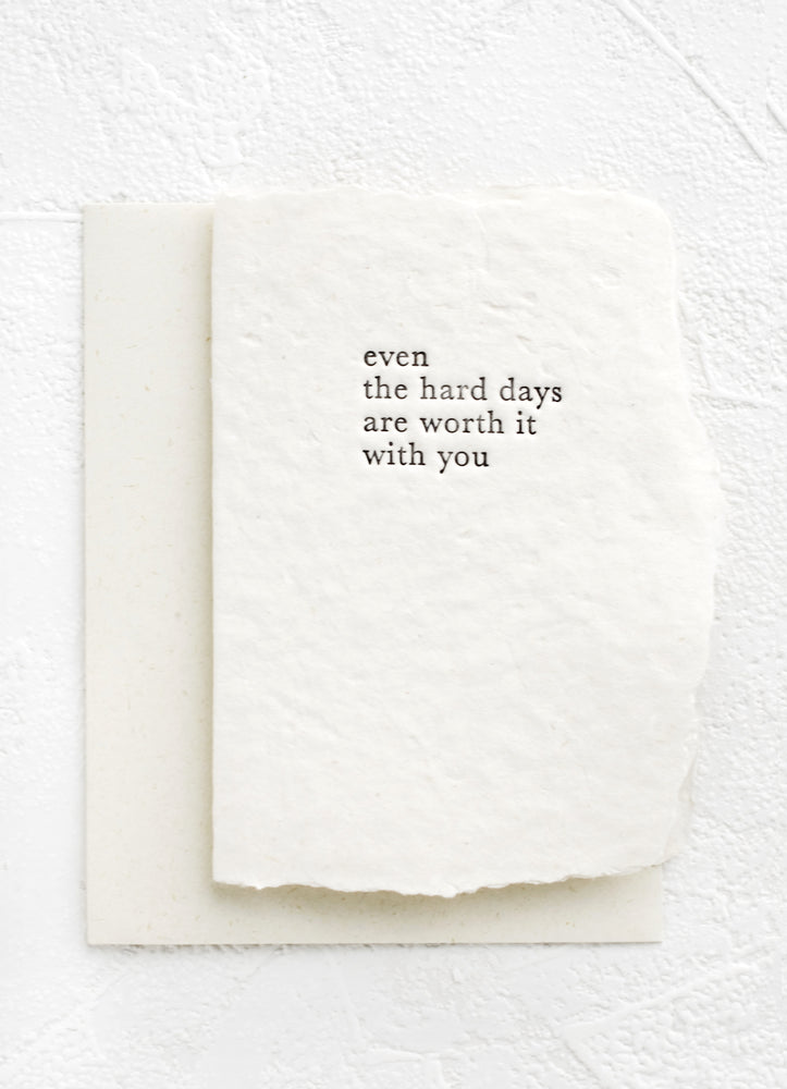 A greeting card made from handmade paper and text on front reads "Even the hard days are worth it with you".