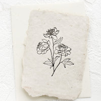 2: A greeting card made from handmade paper with a letterpress printed image of peony stems.