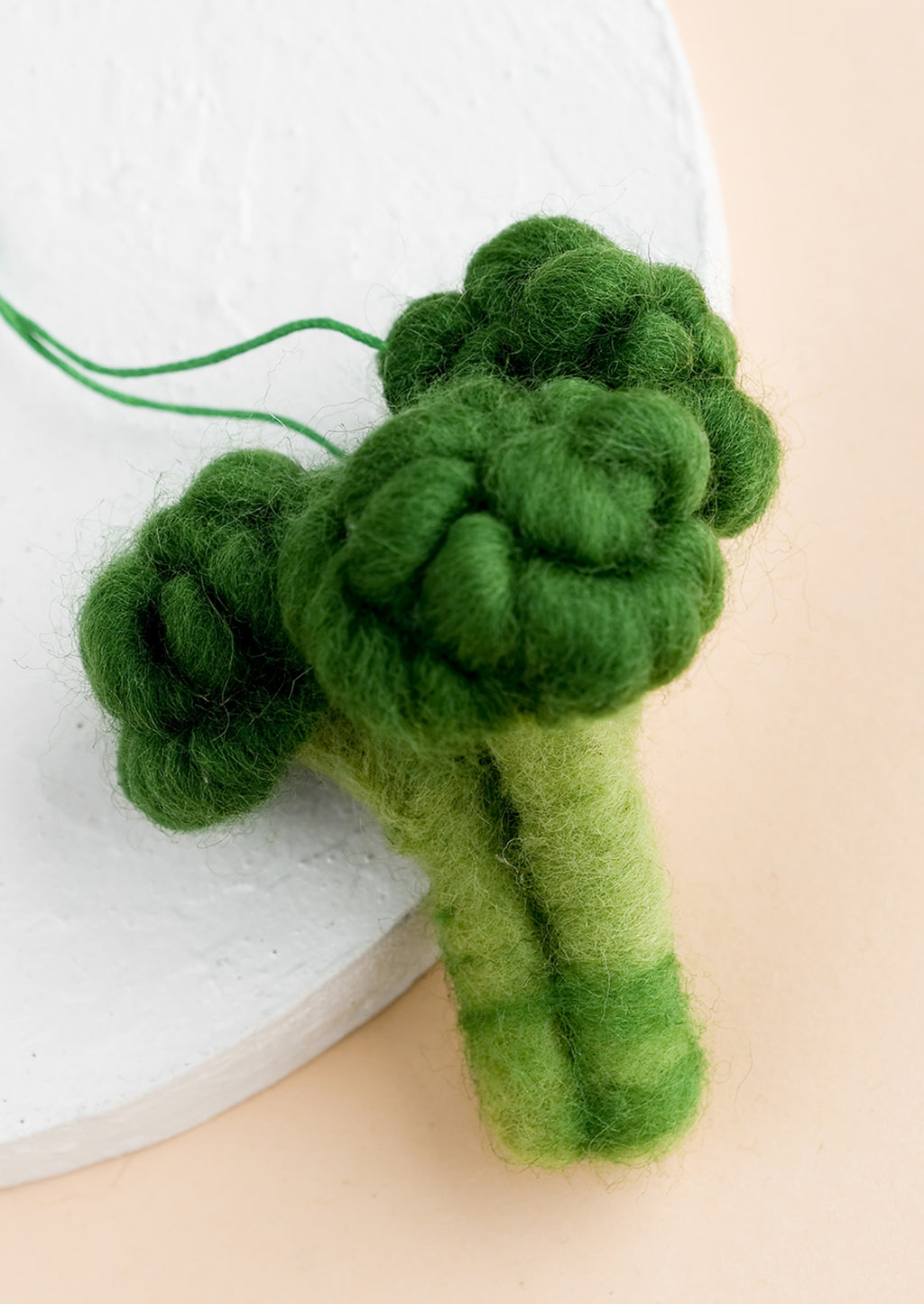 Broccoli: A felted ornament of broccoli.