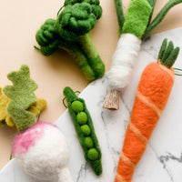 3: Felted holiday ornaments of assorted vegetables.
