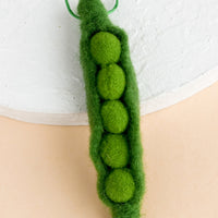 Pea: A felted ornament of a pea.