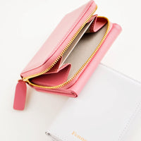 5: Product shot featuring multiple colors of wallet, showing the inside and outside.