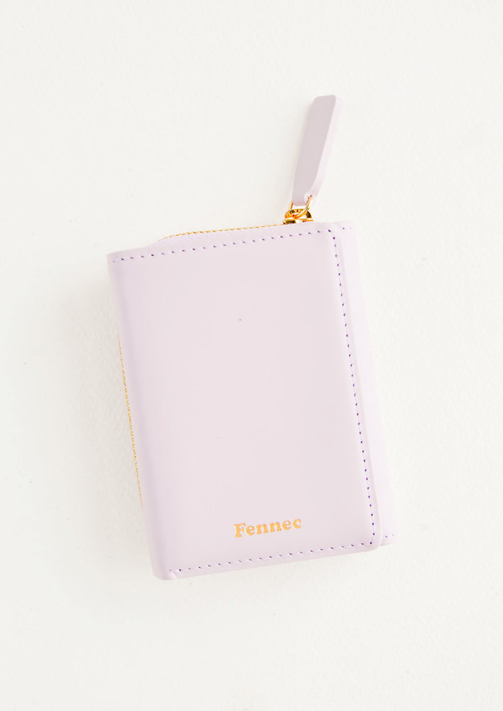 Violet: Violet leather wallet that zips on three sides, in a closed position, with matching tab pull.