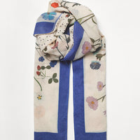 3: A floral printed scarf with flower border and dotted middle.