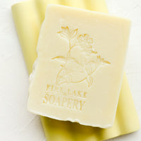 Jasmine: A handmade bar of soap with flower imprint design.