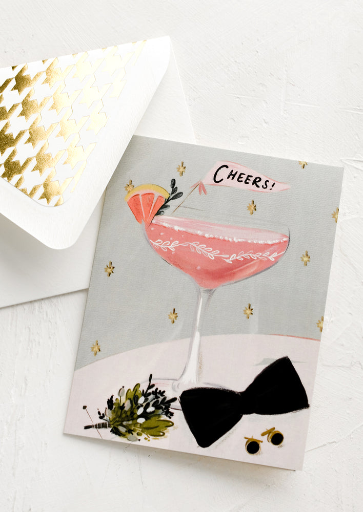 A congratulations card with image of cocktail and black tie.