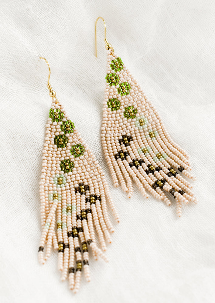 Blush Multi: A pair of beaded floral earrings in pale pink.