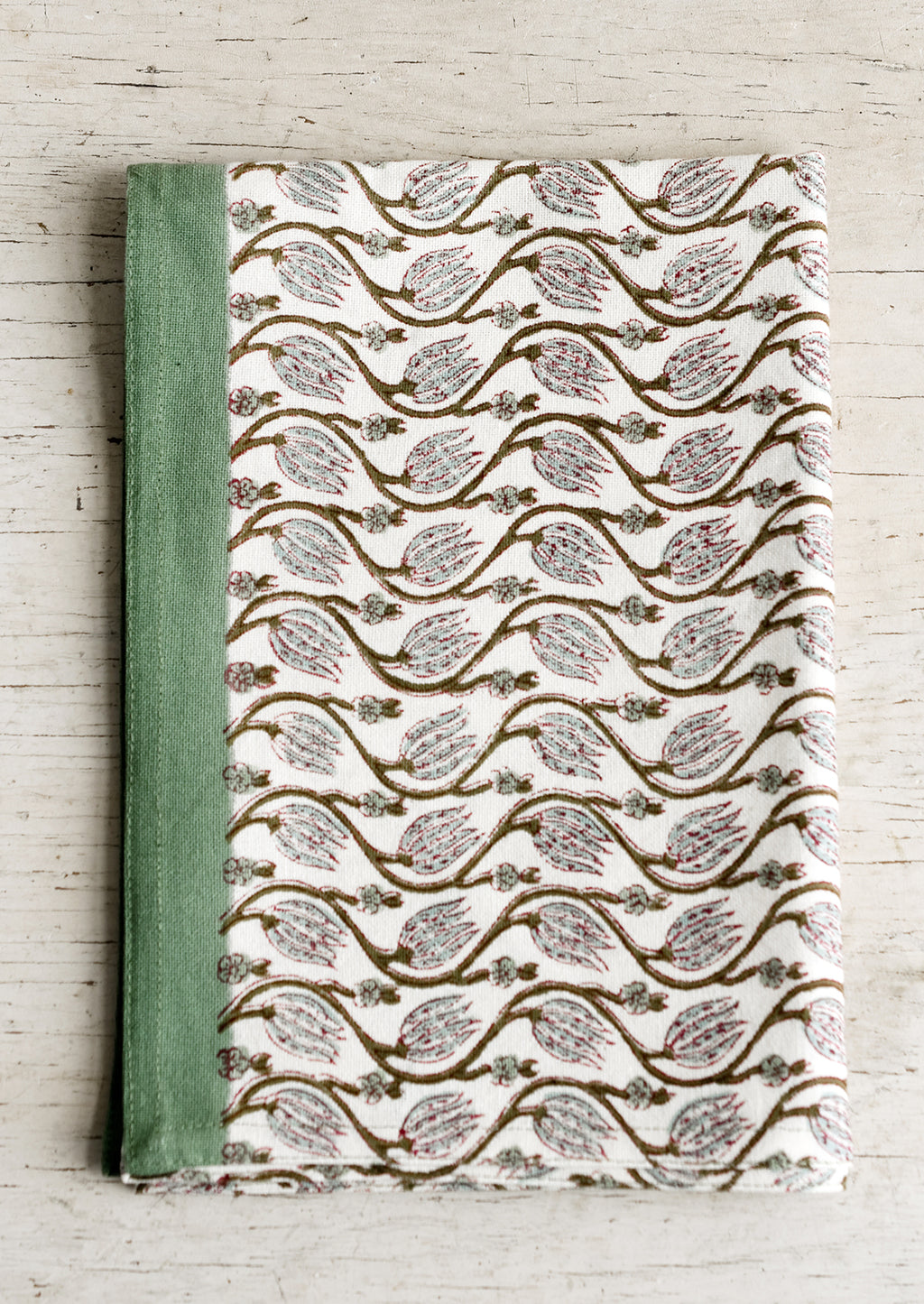 Ivy Multi: A tea towel with ivy green print and trim.