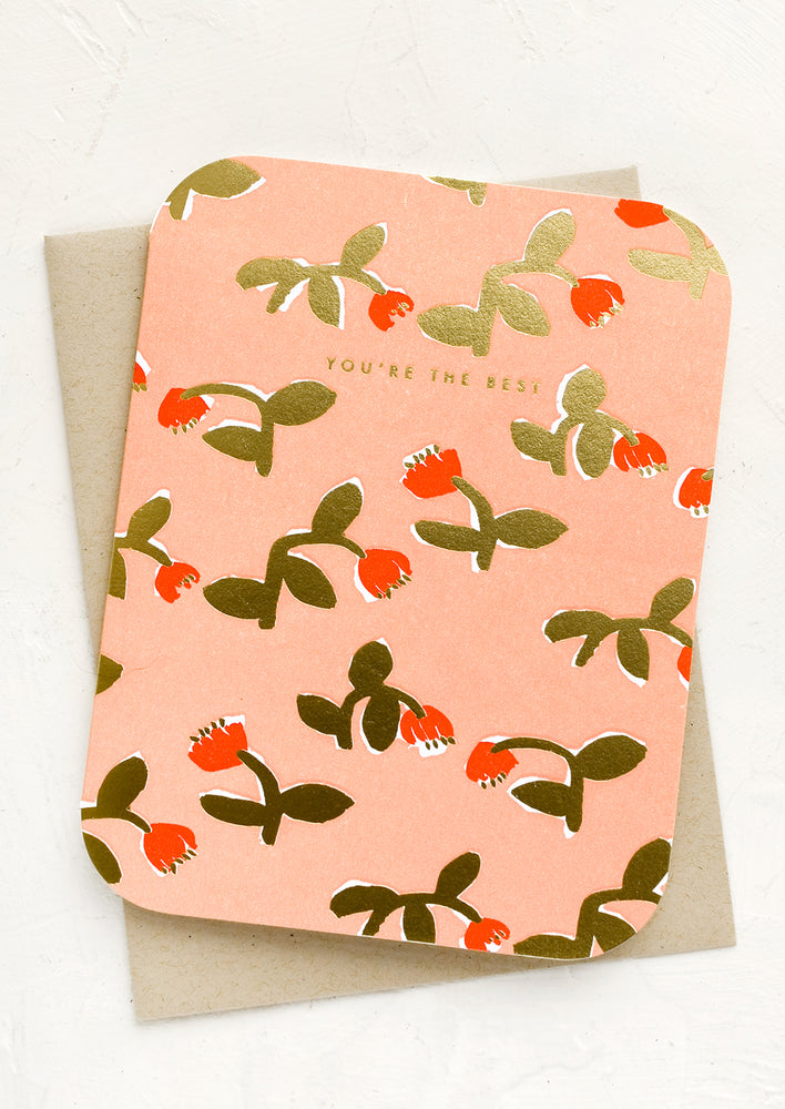 A peach floral print card with text reading "You're the best".