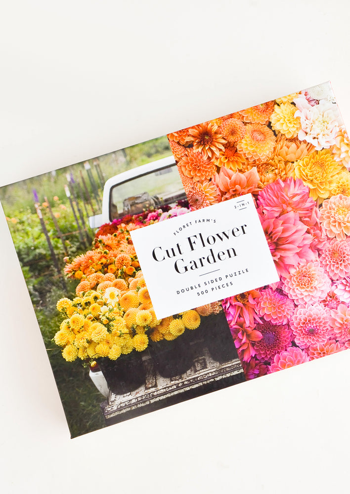 Photographic printed box containing a floral themed jigsaw puzzle
