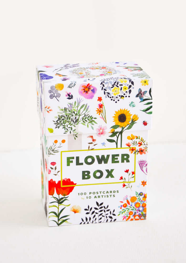 Outside of a box of floral notecards, with drawings of flowers and the text "Flower Box".