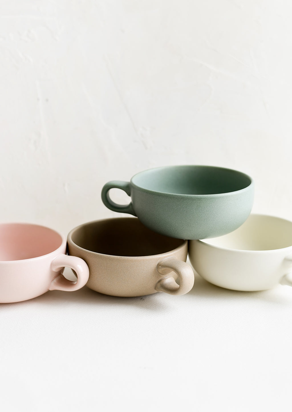 5: Assorted colors of ceramic mug bowls.