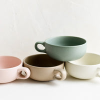 5: Assorted colors of ceramic mug bowls.
