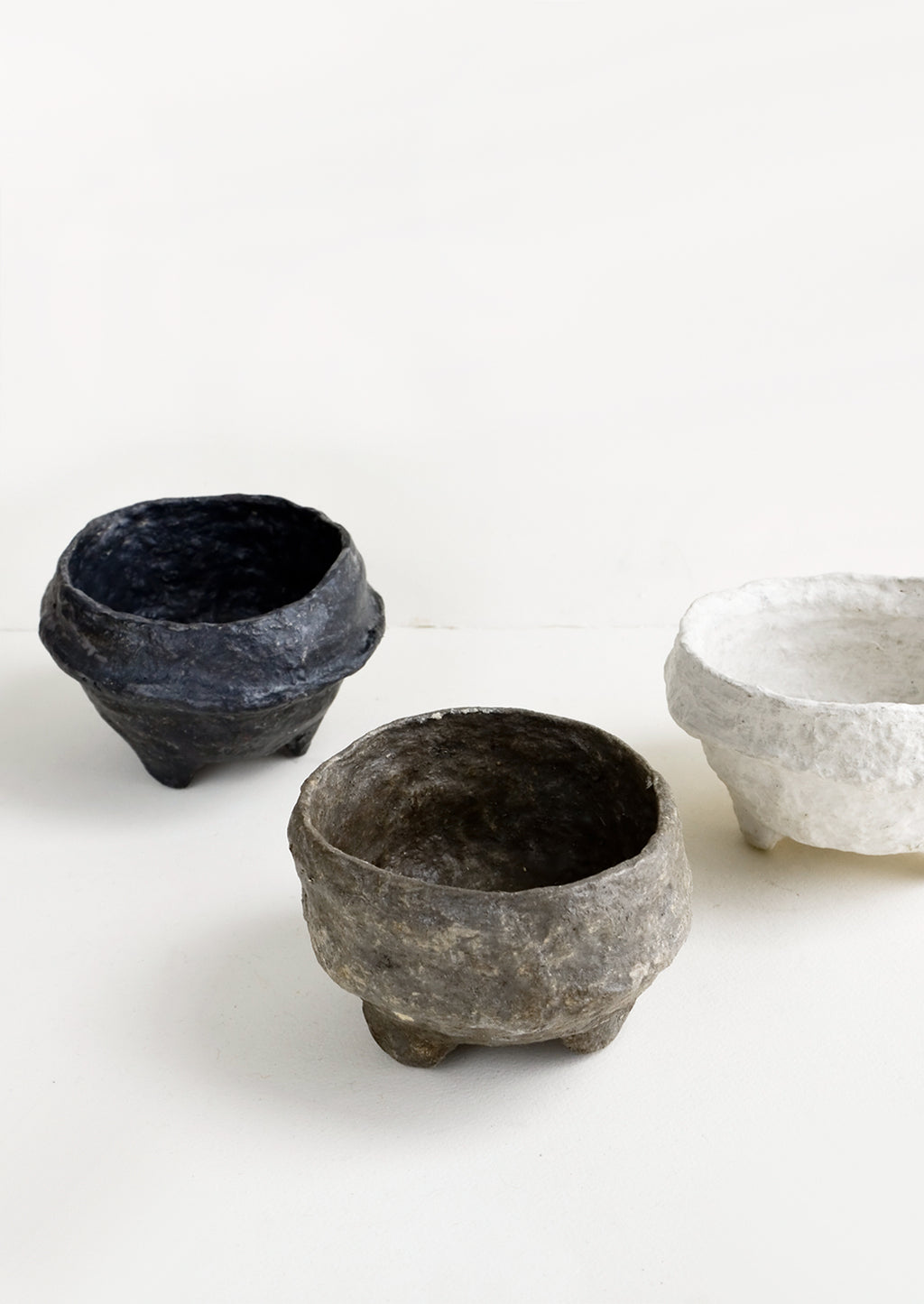 4: Small, decorative footed bowls made from paper mache in either white, black or brown