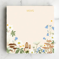 1: A chunky square notepad reading "MEMO" at top with mushroom floral print at bottom.