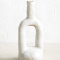1: Ceramic bud vase in off-white glaze with hollow center