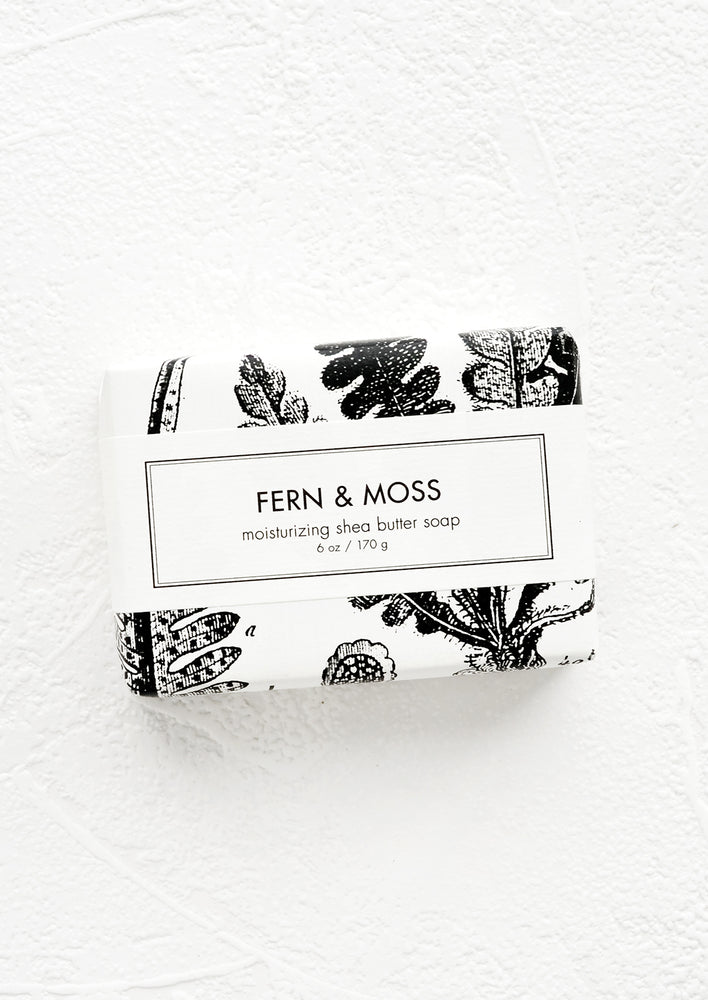 Fern & Moss: A bar of soap in black & white botanical graphic packaging.