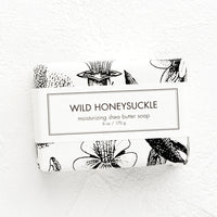 Wild Honeysuckle: A bar of soap in black & white botanical graphic packaging.