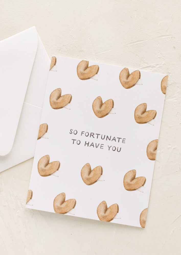 1: A greeting card with fortune cookie print.