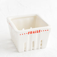 Fraise (Strawberry): A white ceramic basket designed to look like a berry basket with "Fraise" printed in red lettering.