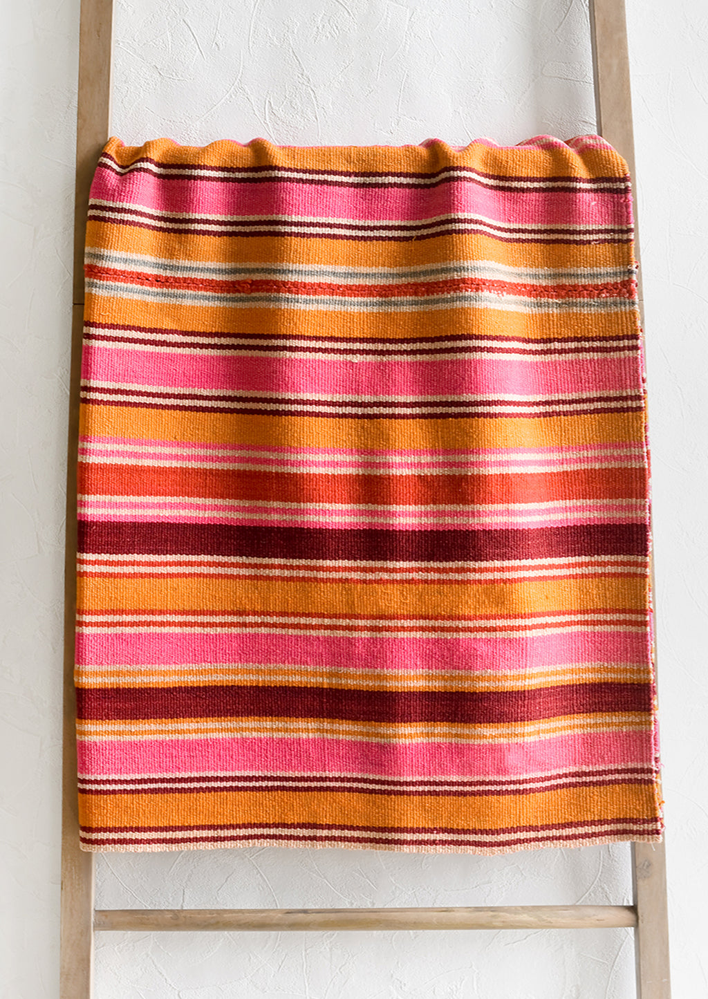 1: A vintage textile in thin pink, orange and burgundy stripe.