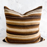 1: Throw pillow made from vintage wool fabric in brown, cream and peach stripes