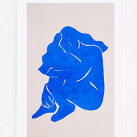 1: Digital art print featuring a bright blue silhouetted image of a woman in the fetal position.