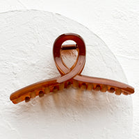 Amber: A french twist acrylic hair clip in amber.