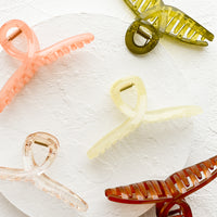 1: Butterfly hair clips in assorted colors.