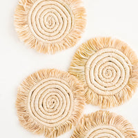 Natural: Set of 4 Circular Raffia Coasters with Fringed Trim in Natural