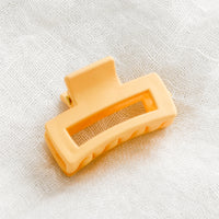 Creamsicle: Small hair claw in creamy orange.