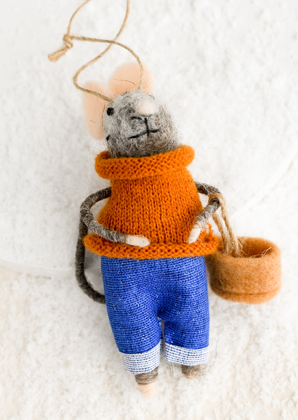 Basket: A felted mouse ornament wearing a sweater and holding a basket.