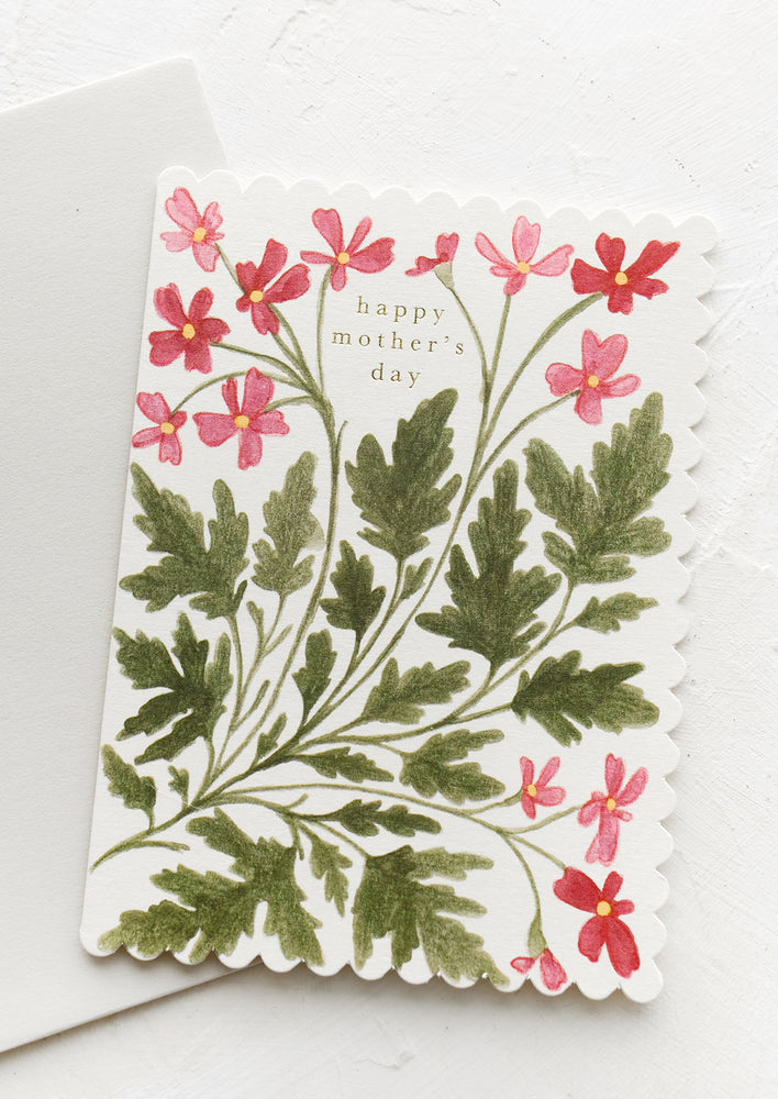 A greeting card with floral print reading "Happy mother's day".