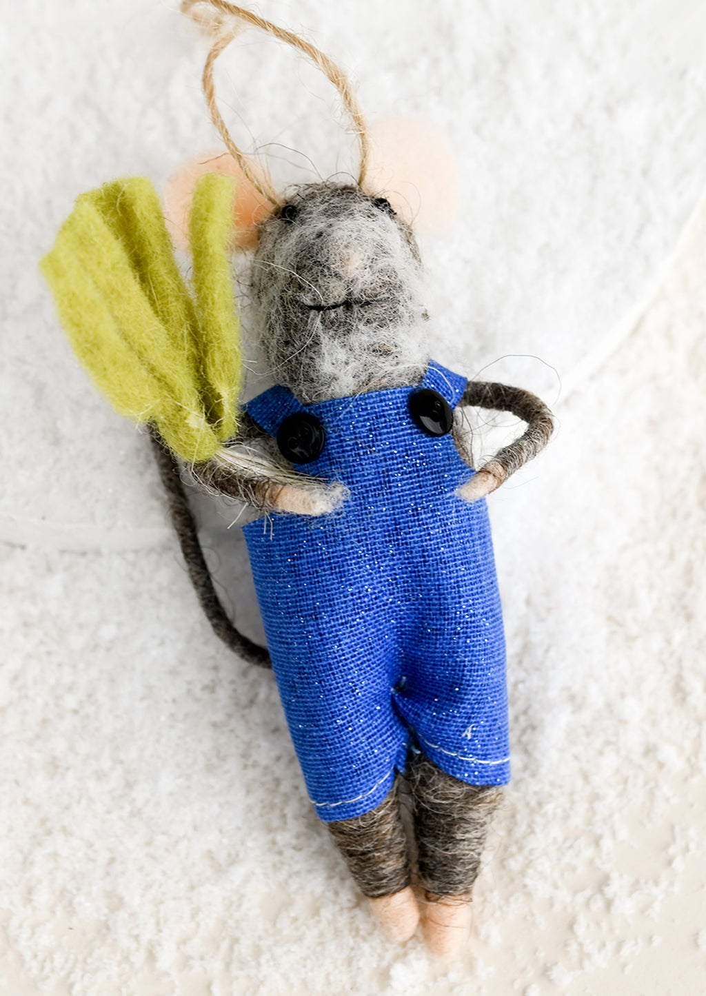 Veggie: A felted mouse ornament wearing overalls and holding a green vegetable.