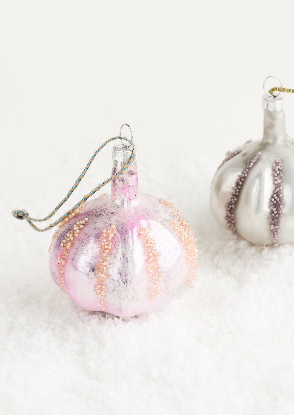 3: A decorative glass ornament in the shape of garlic bulb.