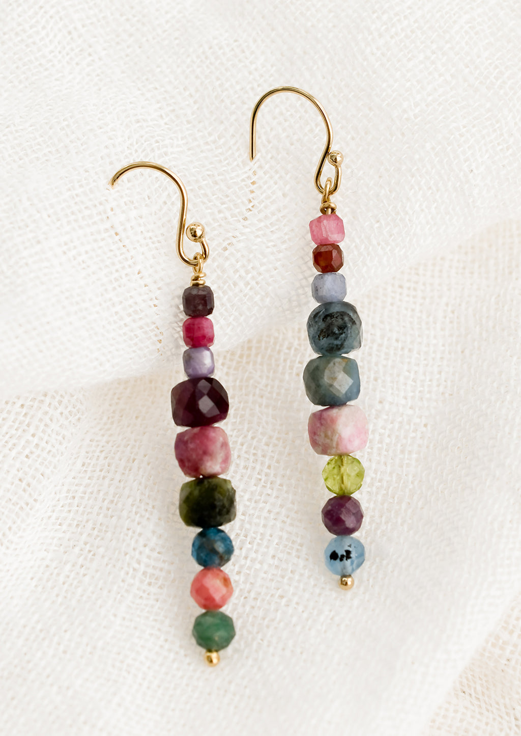 Colorful Multi: A pair of multicolor beaded mixed gemstone earrings in a straight line.