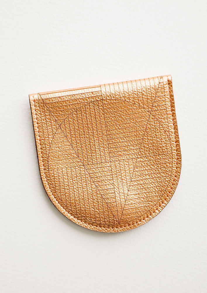 A metallic copper leather half-oval wallet with a subtle geometric pattern.