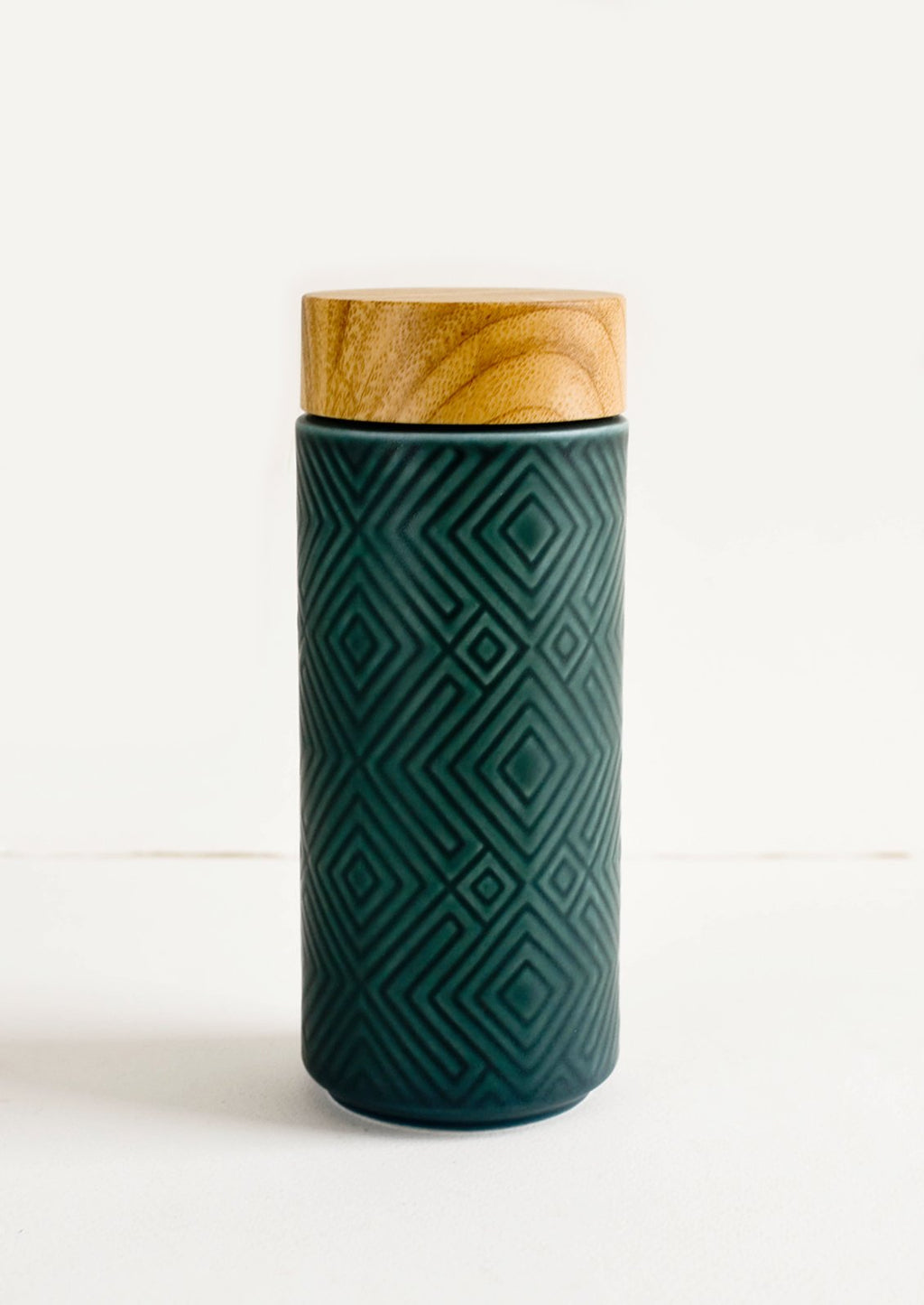 Peacock Green: Geometric textured ceramic tall travel tumbler in peacock green with bamboo lid