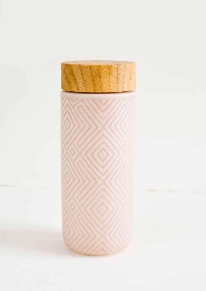 Blush: Geometric textured ceramic tall travel tumbler in light pink with bamboo lid