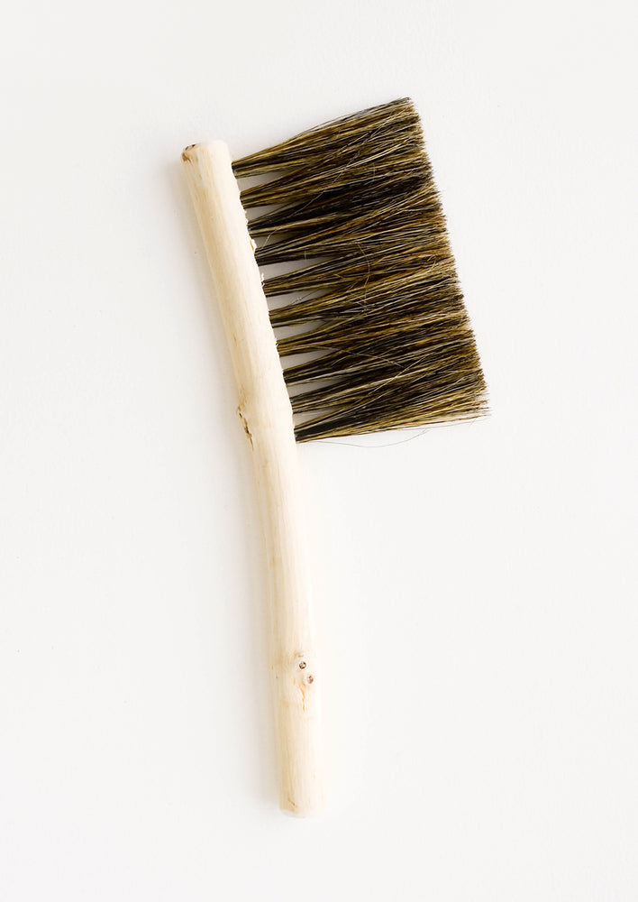 Hand carved bristle brush with thin wooden handle