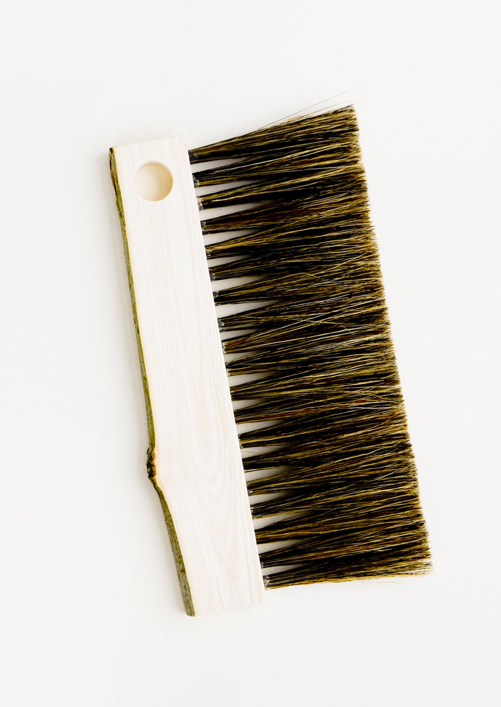 1: Drawing board bristle brush with bark-edged wooden handle and circular cutout for hanging