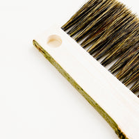 2: Drawing board bristle brush with bark-edged wooden handle and circular cutout for hanging