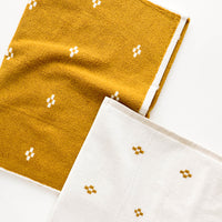 Ochre Geo / Bath Towel: Terrycloth towel set in jacquard design, mustard with geometric print