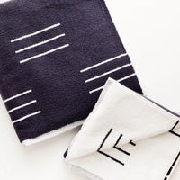 Charcoal Dash / Bath Towel: Set of reversible jacquard weave terrycloth towels in dark grey with modern white line print