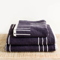 3: Set of terrycloth towels in dark grey with modern white line print
