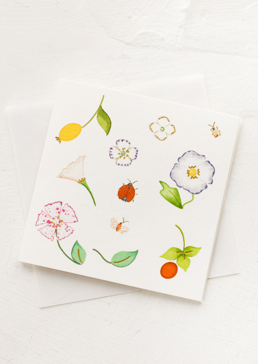 Garden Party: A small gift enclosure card with botanical illustration.