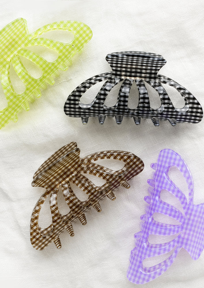 Gingham print hair claws in assorted colors.