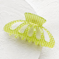 Lime: A gingham print hair claw in lime green.