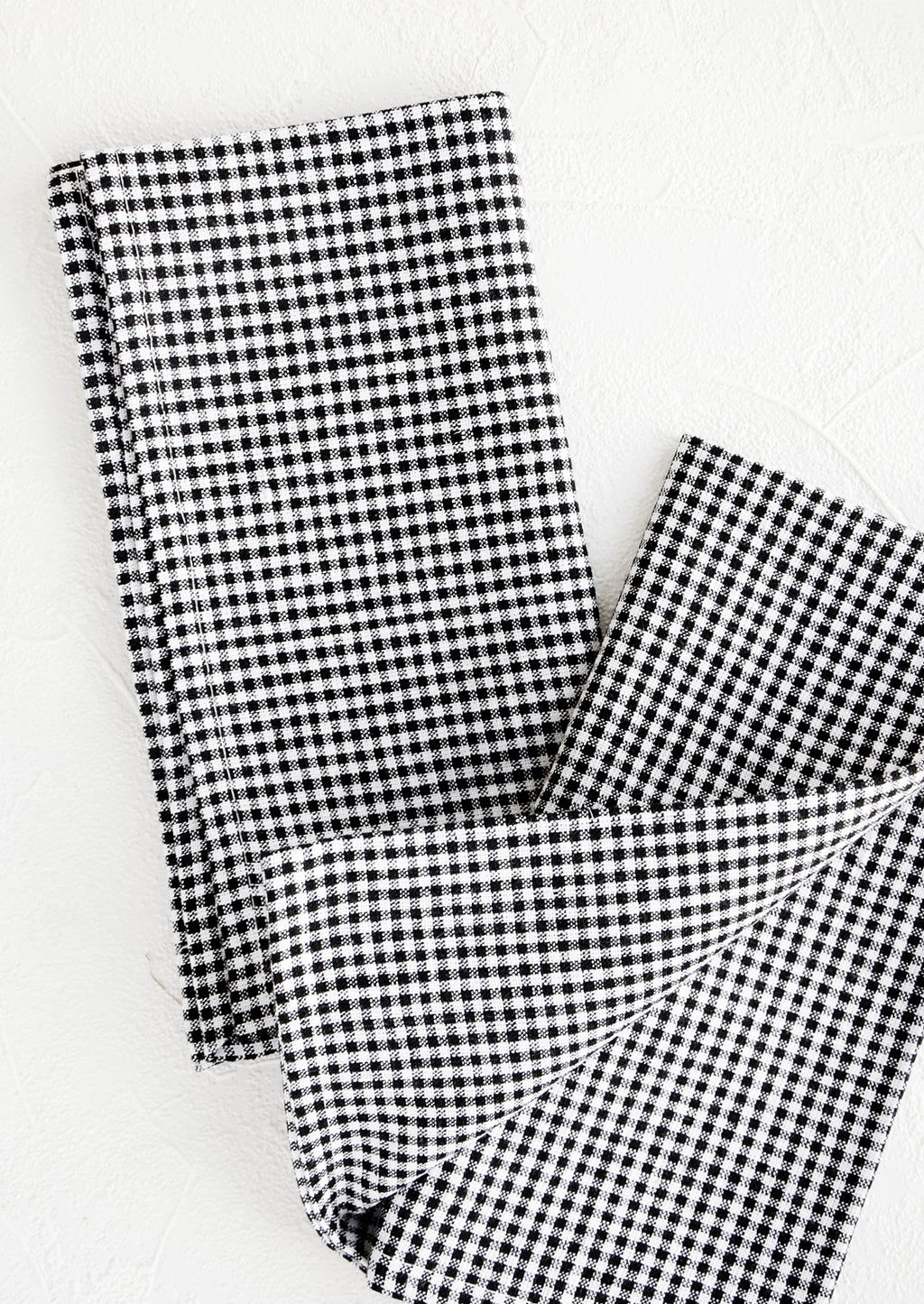 4: Pair of fabric dinner napkins in black and white gingham pattern